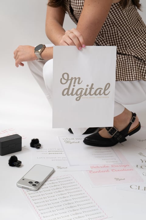 Creative professional with design materials and tech gear
