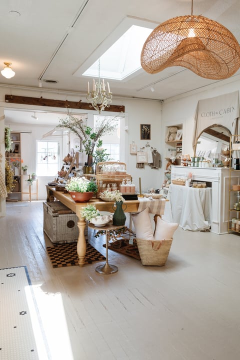 Boutique interior photography showcasing rustic home decor and wooden displays